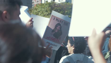 Protesters-holding-signs-commemorating-Mahsa-Amini-killed-by-the-Oppressive-Iranian-Regime