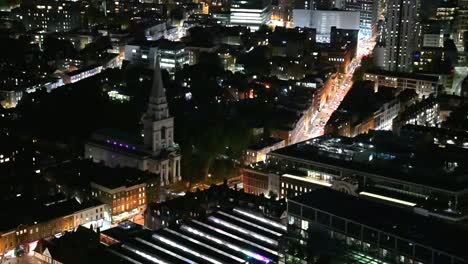 Traffic-passing-Christ-Church-Spitalfields-in-East-London,-United-Kingdom