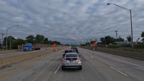 Trucker-stopping-on-the-middle-lane-of-the-American-highway-because-of-roadwork