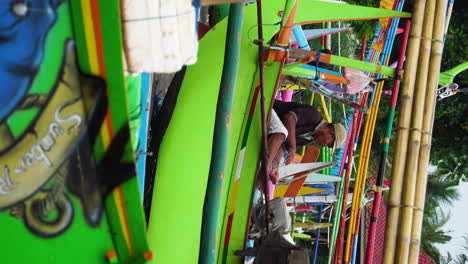 Fisherman-on-traditional-boat-haul-net-preparing-for-fishing