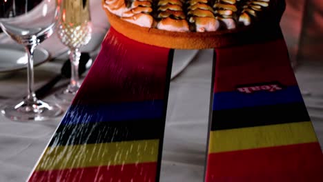 Establishing-shot-of-custom-made-skis-with-La-Folie-Douce-Branding