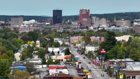 Aerial-drone-footage-of-American-street-populated-by-fast-food-restaurants-and-businesses-outside-of-a-small-city-in-the-northeast