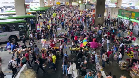 Bus-station-terminal-in-Brasilia,-Brazil-crowded-with-commuters-during-rush-hour