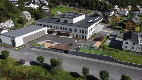 Exterior-of-Dale-school-in-Vaksdal-Norway-seen-from-aerial-perspective-during-sunny-summer-day