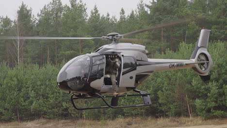 Soldier-in-Military-Helicopter-Shooting-Target-With-Sniper-Rifle-Combat-Training-of-Special-Forces