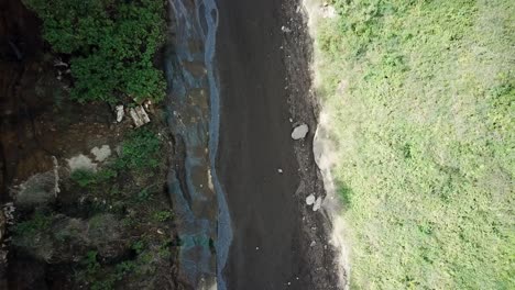 Aerial-drone-view-from-above-of-a-group-of-hikers-walking-along-the-mountain-trails-in-Kenya