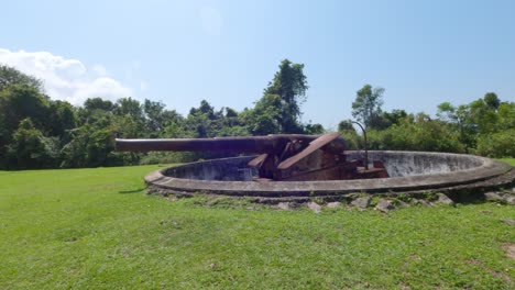 Angra-dos-Reis,-Rio-de-Janeiro,-Brazil---October-17,-2022-Approaching-old-Brazilian-234-mm-cannon