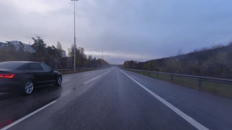 POV-shot-driving-along-the-highway-and-overtaking-a-lorry