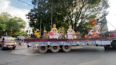 Video-of-the-float-carrying-the-idol-of-Durga-Maa-with-other-deities-to-the-Red-Road-immersion-rally