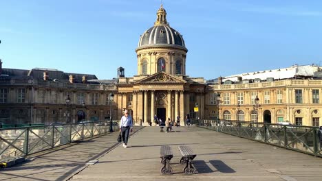 A-View-Of-Institut-de-France-A-The-Pedestrian-Bridge-Of-Pont-des-Arts-In-Paris,-France