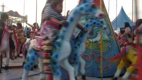 Carousel-with-superhero-ornaments-on-which-the-little-ones-ride