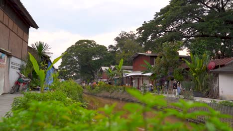 Slow-motion-scenery-at-Canal-with-slums-in-South-East-Asia