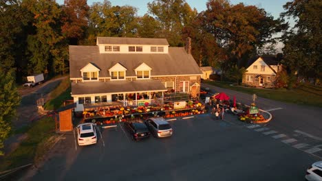 Rural-farm-store-with-pumpkins-and-fall-decor-for-sale-in-autumn