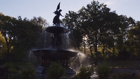 Angel-of-Waters-Statue-at-Bethesda-Terrace-Fountain-Central-Park-New-York-City-Manhattan-in-Sunny-Morning,-Urban-Architectural-Monument-Art-and-Water-Flowing