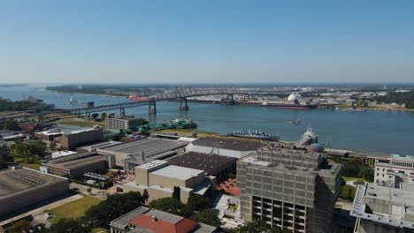 Horace-Wilkinson-Bridge-and-Downtown-Baton-Rouge,-Louisiana-Wide-Aerial-Orbiting-Right