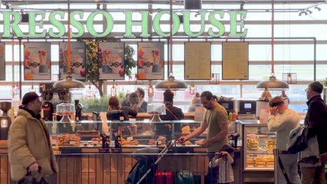 People-ordering-food-at-Copenhagen-Kastrup-Airport,-Denmark