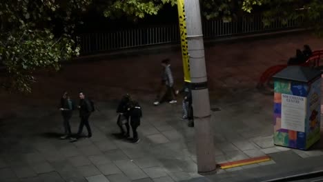 People-walking-past-the-Southbank-Centre-in-the-evening,-London,-United-Kingdom