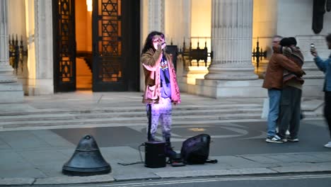 Singer-outside-of-Museum-of-Freemasonry,-Freemasons-Hall,-London,-United-Kingdom