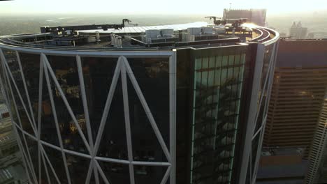 Aerial-view-close-to-office-windows-on-the-Bow-building-in-downtown-Calgary,-Canada