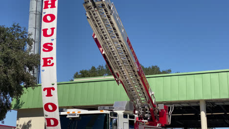 Tilt-down-shot-of-Annual-Open-House-event-banner-hosted-by-Temple-Terrace-fire-department-of-Florida-to-pay-homage-to-firefighter-heroes