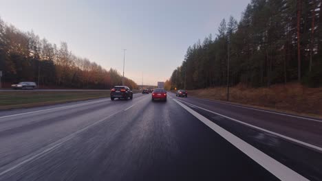 Highway-driving-POV:-Busy-commute-vehicle-traffic-on-suburban-freeway