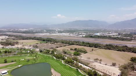 A-drone-shot-over-the-international-airport-of-Puerto-Vallarta-Mexico