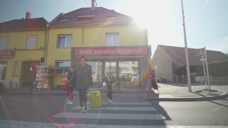 Family-using-a-road-crossing