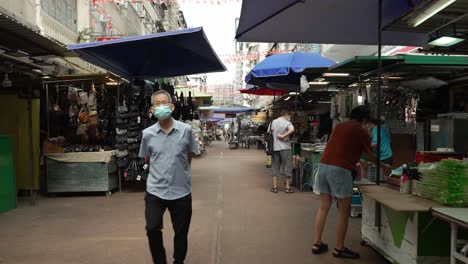 El-Ambiente-De-La-Calle-Del-Mercado-Y-El-Paso-De-La-Gente-En-Hong-Kong