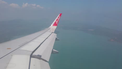 View-of-the-plane-wing-through-the-airplane-window