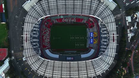 Aerial-view-above-the-Estadio-Azteca-stadium,-in-Mexico-City---rising,-top-down,-drone-shot