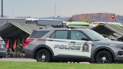 Buses-and-police-cars-are-parked-outside-of-the-police-funeral