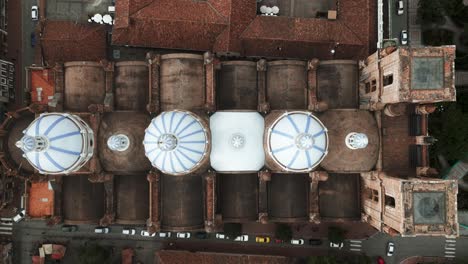 Aerial-Drone-Fly-Above-Three-White-Domes-New-Cathedral-Cuenca-Ecuador-Immaculate-Conception,-Religious-Iconic-Architecture-in-Latin-American-Colonial-City