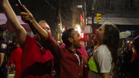 In-spite-of-the-rain,-a-crowd-gathers-to-celebrate-the-election-of-Luiz-Inacio-Lula-da-Silva-in-Brazil-in-October-2022