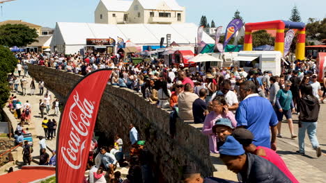 Visitors-enjoying-Hermanus-Whale-Festival---crowded-streets,-static-shot