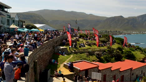 Hermanus-waterfront-bustling-during-Whale-Festival,-Cape-Whale-Coast