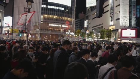 Thousands-of-Halloween-goers-crossing-Shibuya-Scramble-at-Night