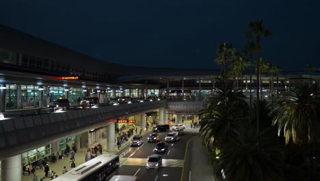 Jeju-International-Airport-at-Night-in-South-Korea---Elevated-view,-Airplane-takeoff