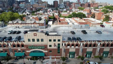 Sliding-shot-of-a-Whole-Foods-located-in-South-Philadelphia-with-a-parking-garage-on-top