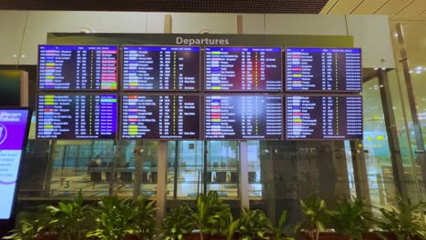 Close-up-shot-of-departures-screen-showing-the-names-of-the-flight-take-off-from-the-airport