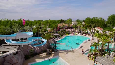 Establishing-drone-shot-of-the-waterpark-at-the-Marsseillan-Campsite