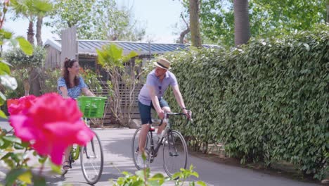 Happy-couple-cycling-in-Marseille,-France