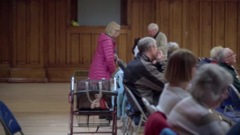 Old-people-gather-for-a-townhall-meeting