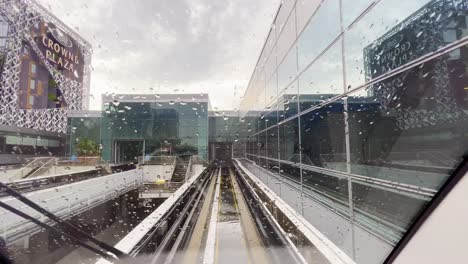 Back-view-shot-of-metro-Leaving-on-station-and-heading-towards-the-different-station