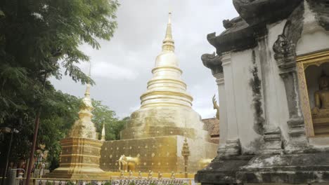 beautiful-view-of-Wat-Phra-Singha-temple-with-golden-glow-pagoda