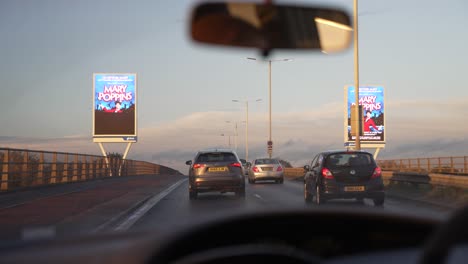 6-November-2022---View-From-Backseat-Of-Car-Driving-Along-The-A312-The-Parkway-In-London-During-Sunset