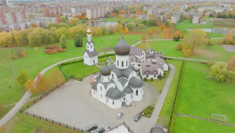 A-aerial-view-of-orthodox-church-Pokrov-Nikolskaya,-the-church-stands-in-the-southern-part-of-the-Klaipeda-city