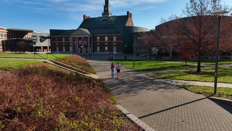 Aerial-view-of-people-walking-in-the-Bearcats-Commons-park,-sunny-fall-day-at-the-Unveristy-of-Cincinnati,-USA