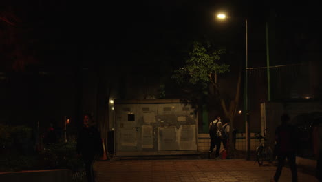 People-walking-on-the-street-of-night-in-Hongkong