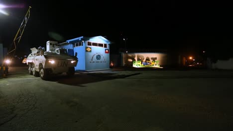 UN-armored-vehicle-leaving-base-territory-in-Port-au-Prince,-Haiti