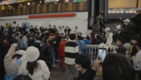 Young-Japanese-Dance-and-Party-in-the-Streets-of-Dotonbori-in-Celebration